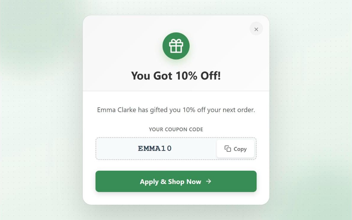 Welcome popup a referred friend sees, saying Emma Clarke has gifted them 10% off, with the coupon code EMMA10 and an Apply and Shop Now button